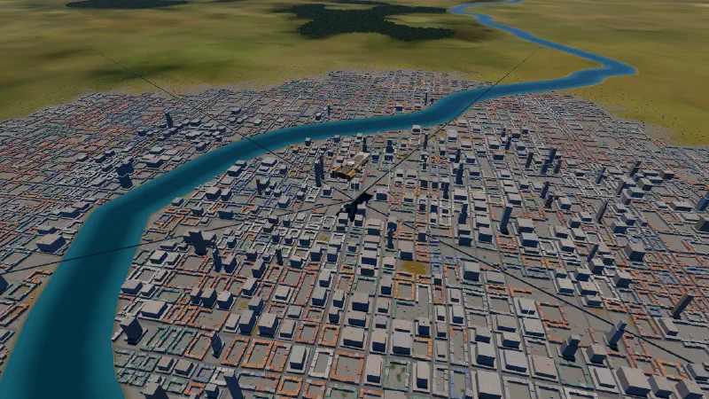 A dense city of blocks with orange, slate and green roofs, towers in the core, a blue river curving through it.