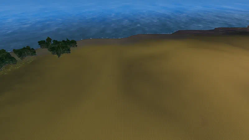 A muddy shore with a few trees meeting the sea, waves glinting, seen from 300 m.